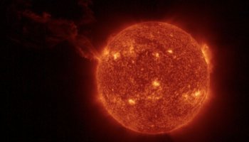 A stunning NASA image shows an enormous solar flare emerging from a new region on the surface of the sun